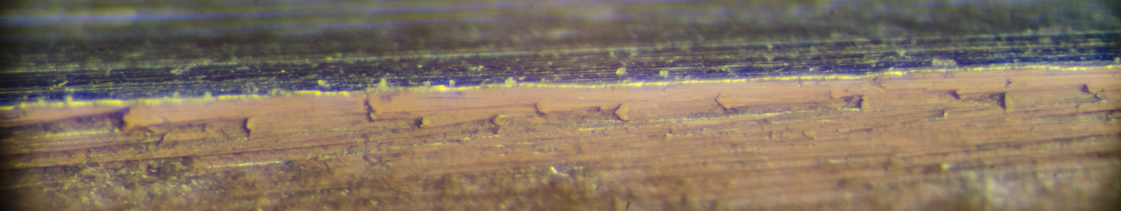 Worn card scraper edge